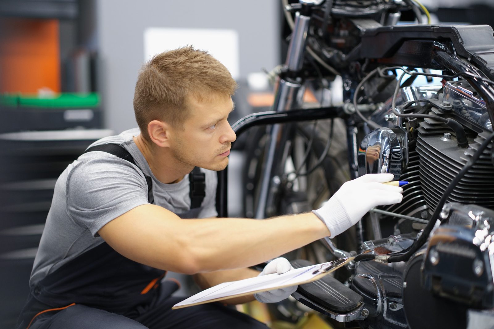 Motorcycle on lift in service bay